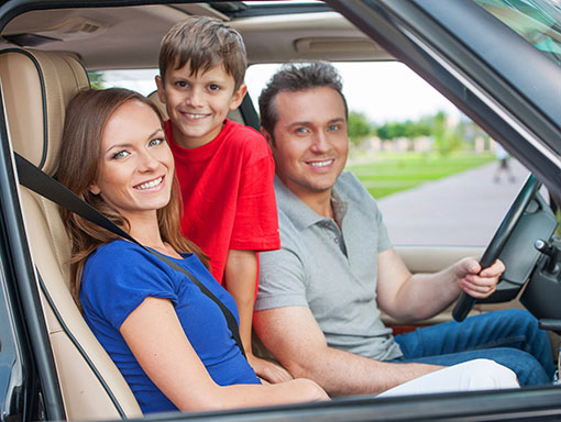family smiling in car | Pollock Advanced Dental Group
